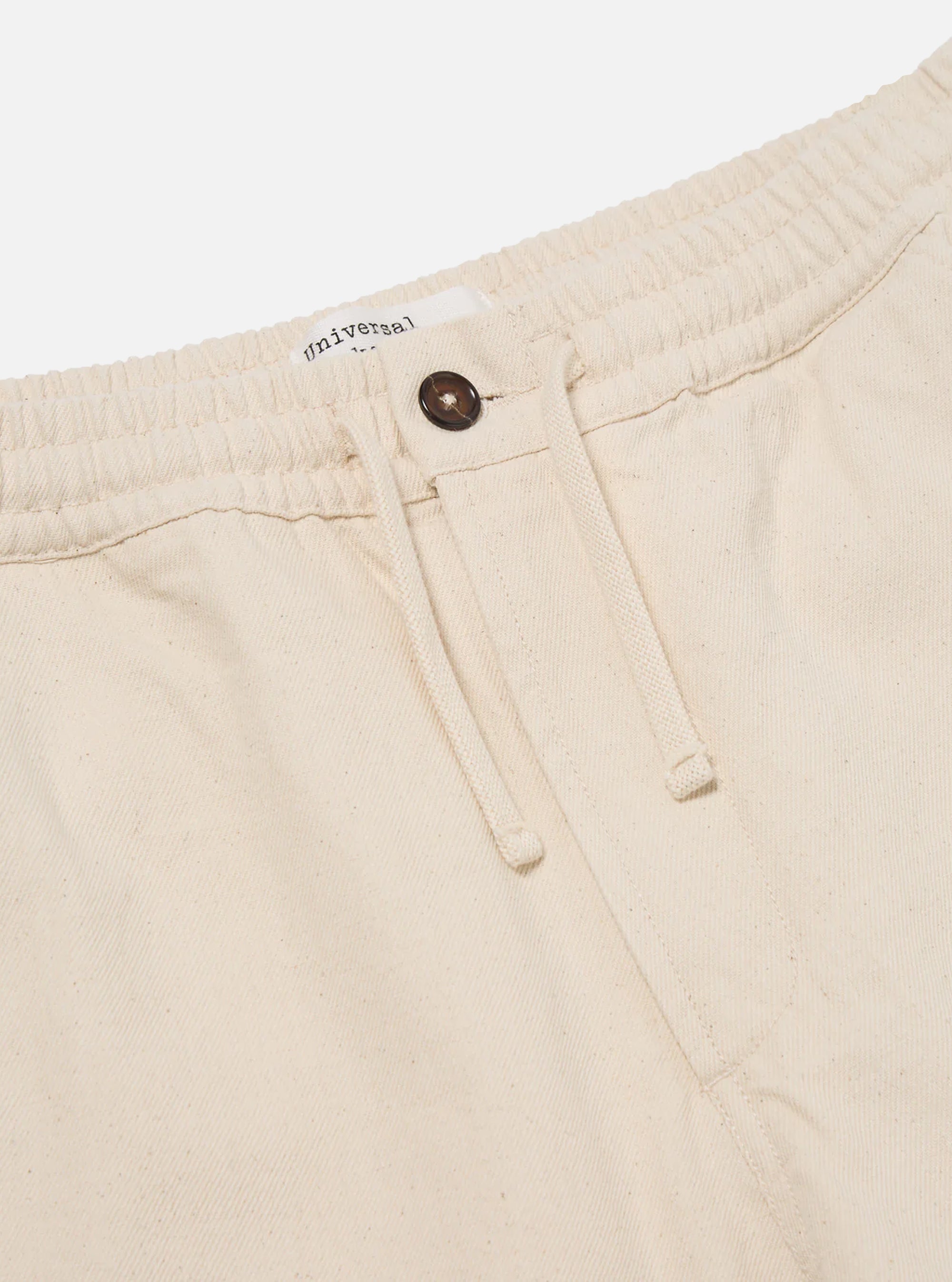 Pantalón Hi Water de Universal Works en algodón reciclado color crudo