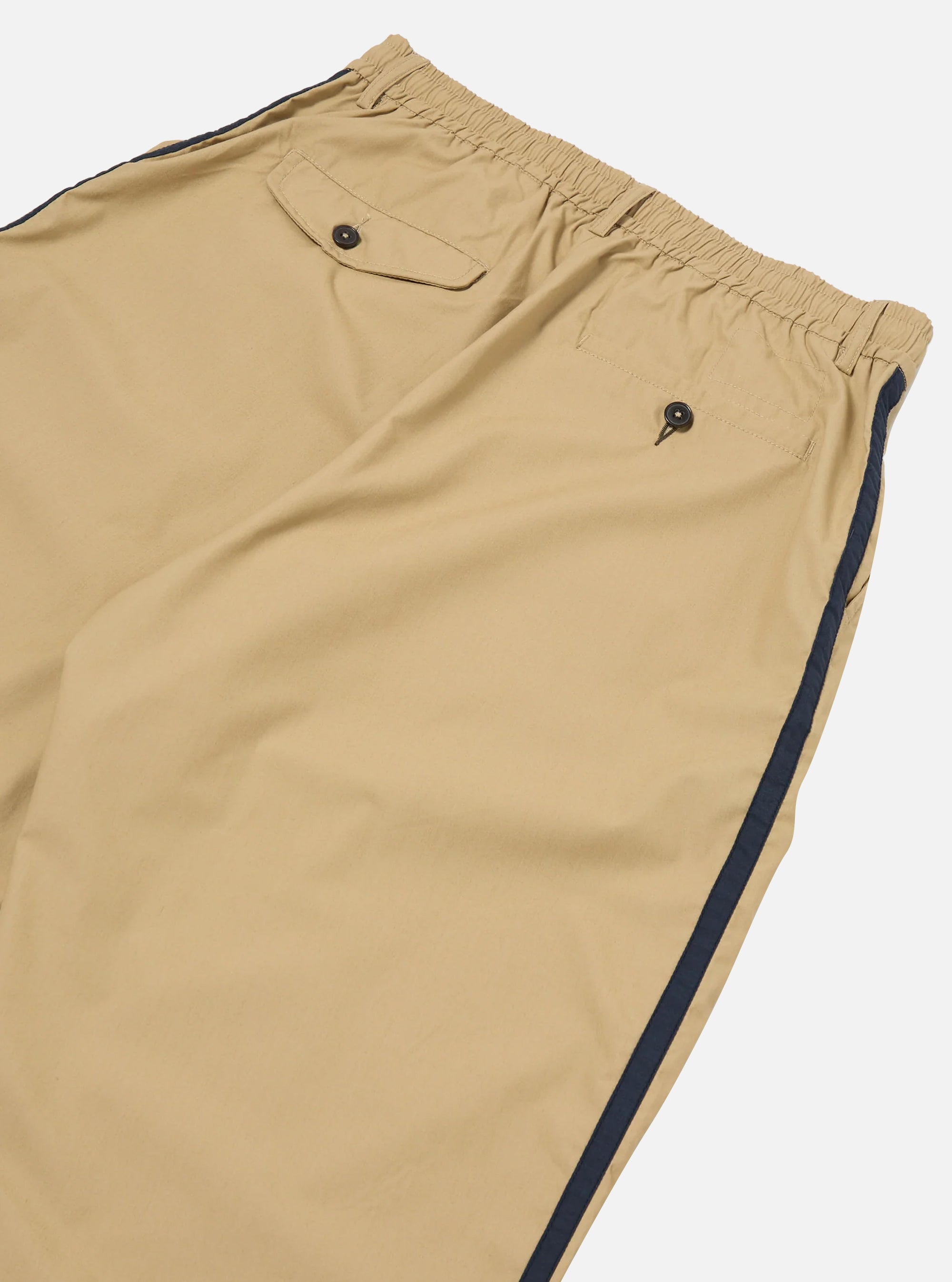 Pantalón Oxford Universal Works color arena con ribete lateral