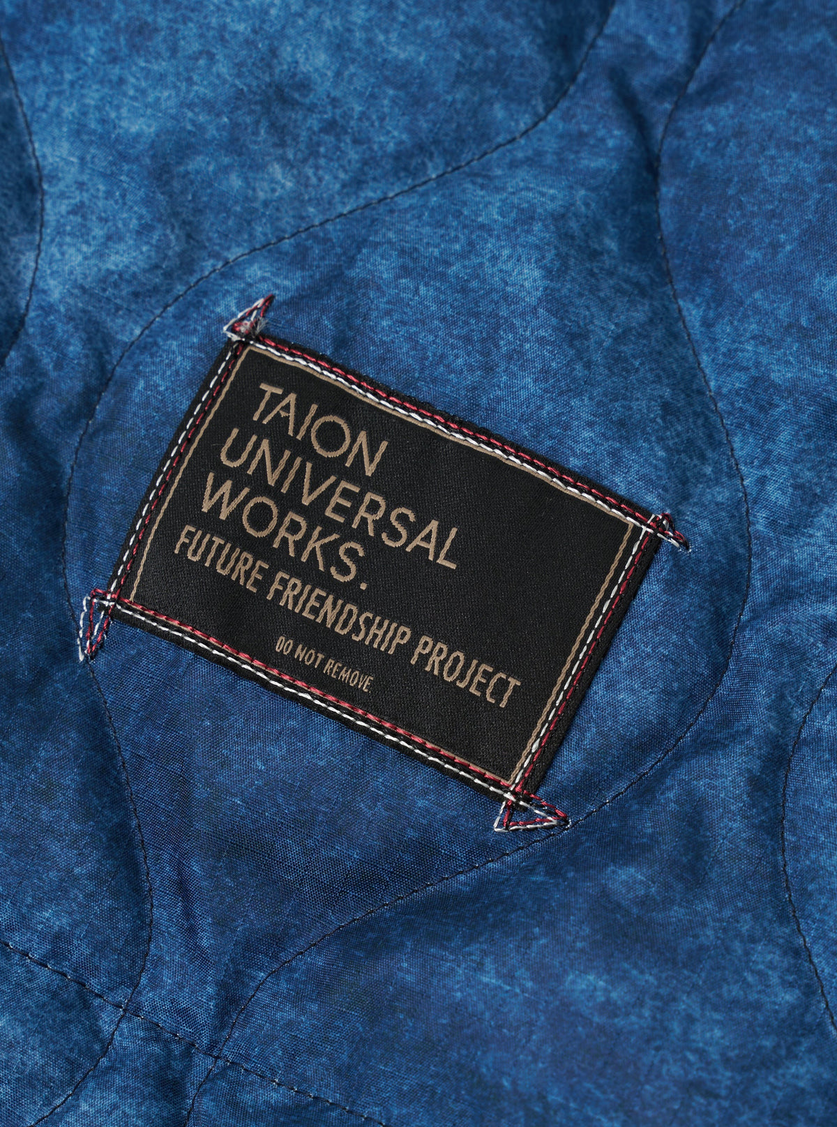 Parka Down Mod de Universal Works x Taion